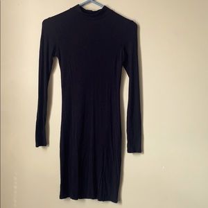 Black mid-turtle neck dress w/split